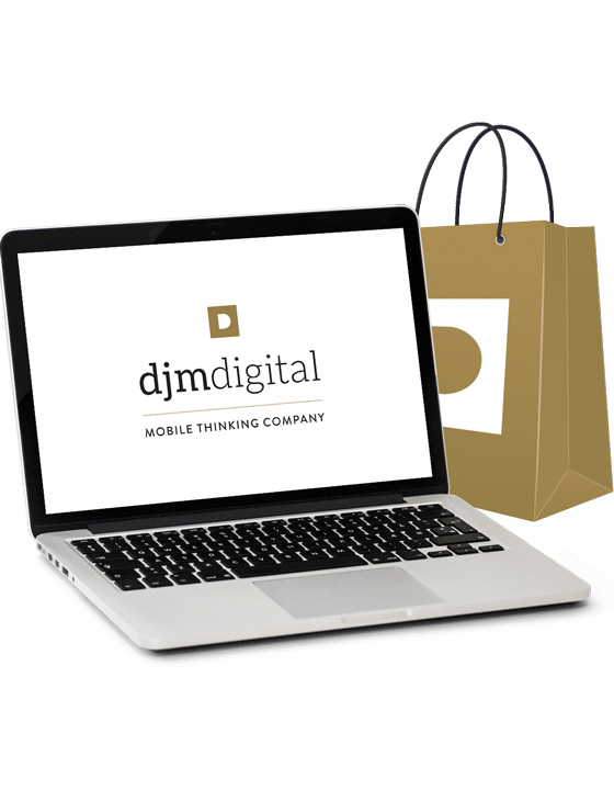 Ordinateur portable et sac de shopping